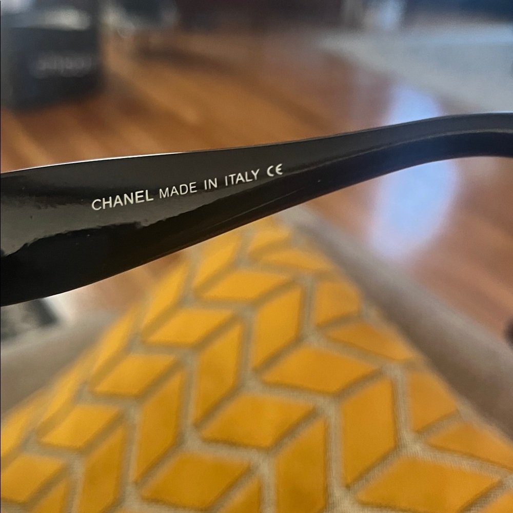 CHANEL Glossy Black Sunglasses with Gold Accent - Picture 3 of 3